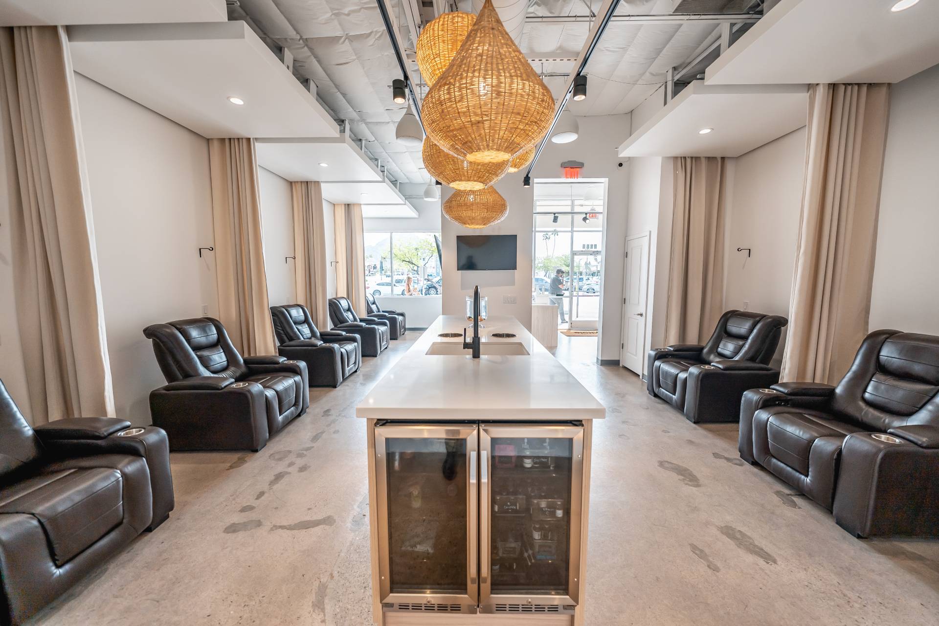 Relaxing IV Therapy zone with black leather chairs at IV Bar Phoenix